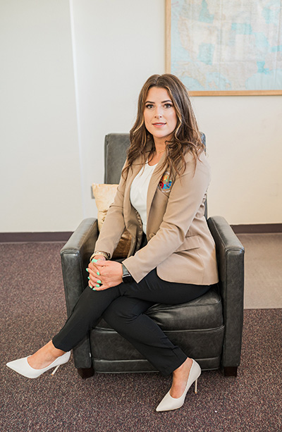 photo of Kalah Carrasco seated