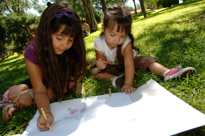 Two girls drawing